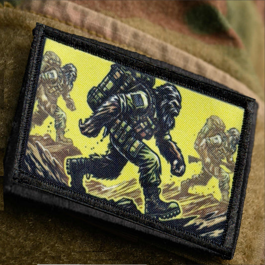 Sasquatch Ruck morale patch attached to an OCP military jacket sleeve loop panel as tactical cryptid humor
