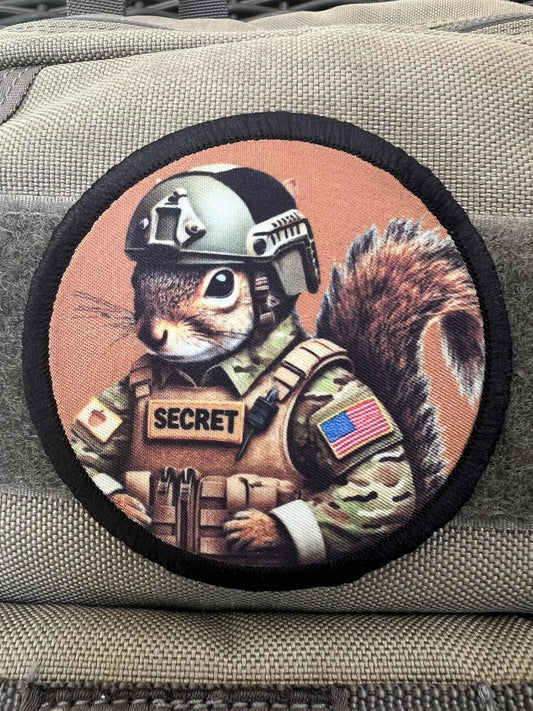Secret Squirrel Hook and Loop Morale Patch on tank backpack