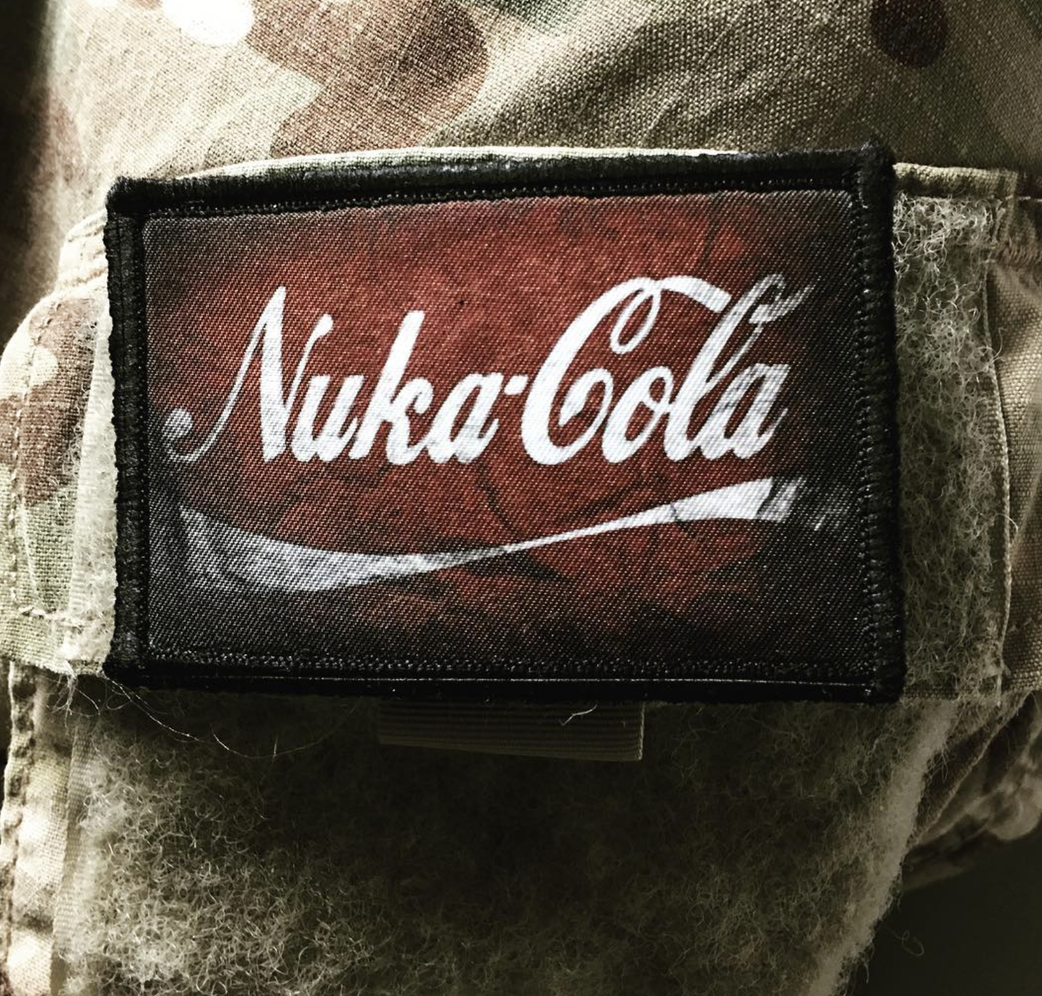 Nuka-Cola Logo on a Patch, which is on a sleeve of a jacket