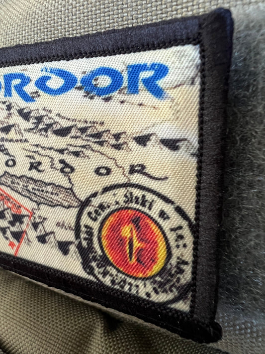 Embark on an Epic Adventure with the Mordor Passport Stamp Morale Patch by Redheaded Productions