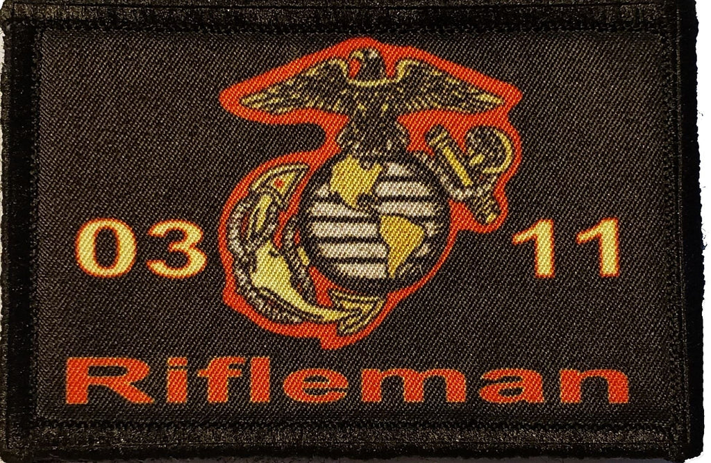 Honor the 0311 USMC Marine Rifleman with the Redheaded Productions' Velcro Morale Patch