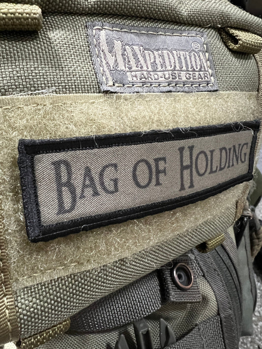 Unleash Your Inner Hoarder with the Redheaded Productions "Bag of Holding" Morale Patch!