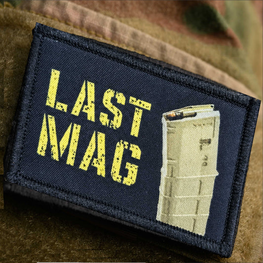Last Mag Hook and Loop Morale patch on camo jacket