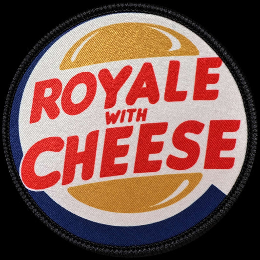 Main image of the Royale with Cheese morale patch with bold red lettering and golden hamburger bun graphics