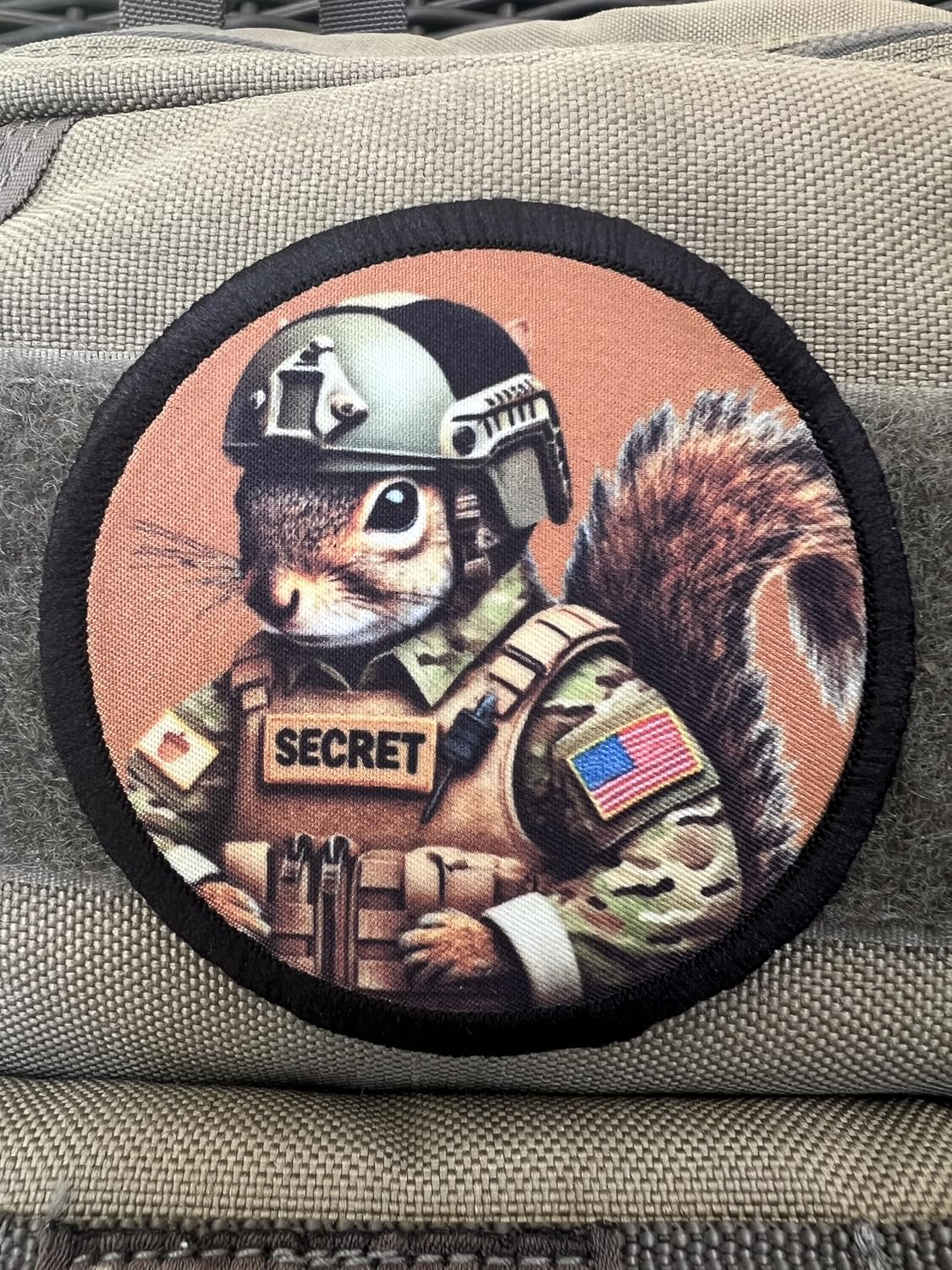 Secret Squirrel Hook and Loop Morale Patch on tank backpack