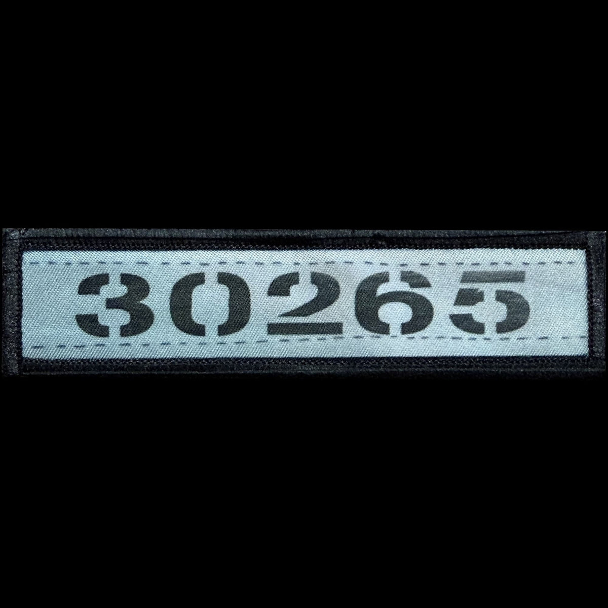 Shawshank Redemption Red's Prison Number morale patch showing 30265 in black stencil text on a blue-gray strip