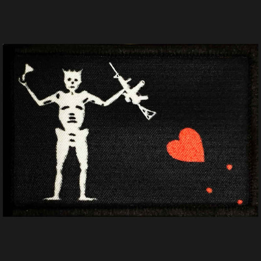 M4 Blackbeard Pirate Flag Morale Patch close-up of dye-sublimation printed skeleton detail and red blood drops on black background