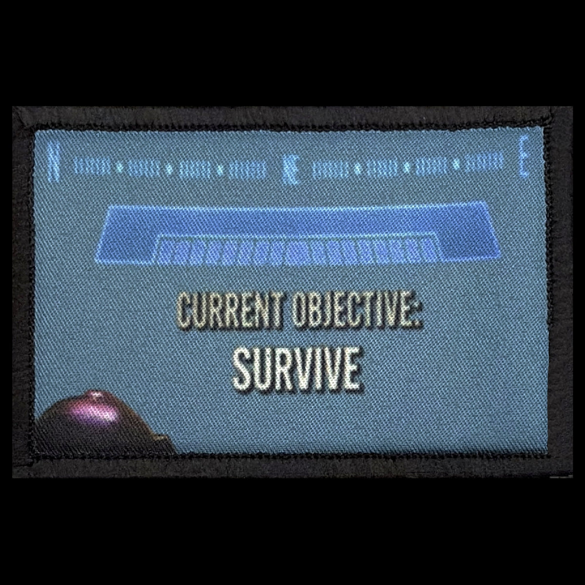 Halo Reach Current Objective Survive morale patch attached to a tactical backpack or range bag with hook and loop backing