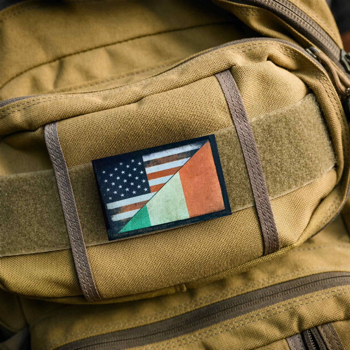 : Distressed American and Italian flag patch displayed on the hook-and-loop panel of a backpack