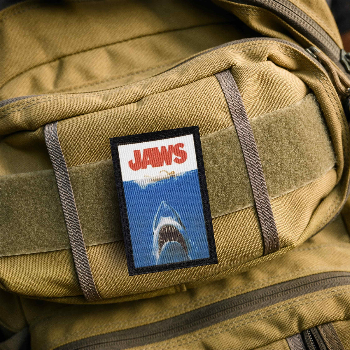 Jaws Shark Morale Patch measuring 2x3 inches with loop-side hook and loop backing for tactical gear and plate carriers