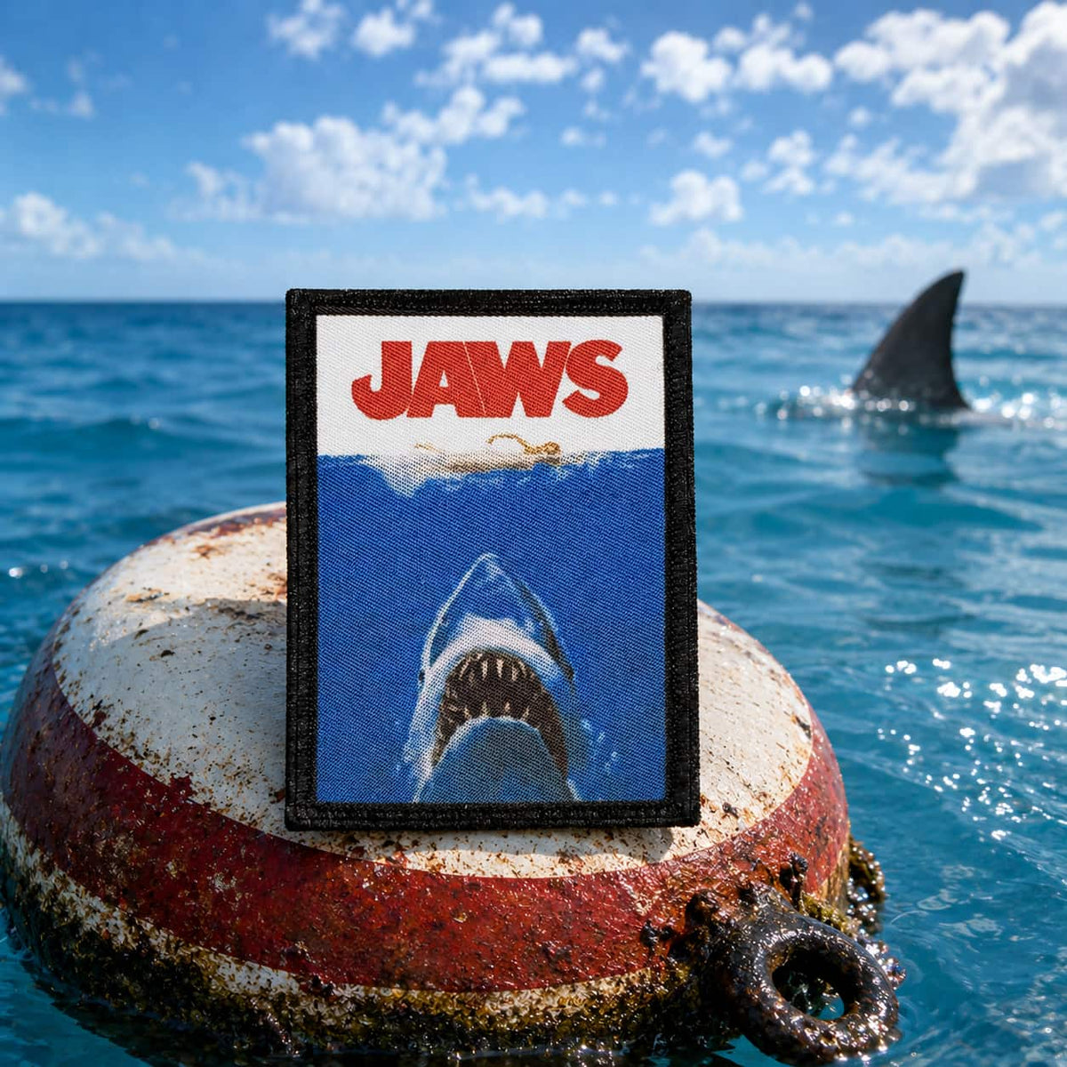 Jaws Shark Morale Patch with dye-sublimation printed vivid color detail of swimmer at surface and shark ascending from below