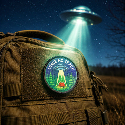 Close-up of the Leave No Trace UFO Patch showing the washable dye-sublimation print with sharp starfield and tractor beam detail that won't fade or crack.
