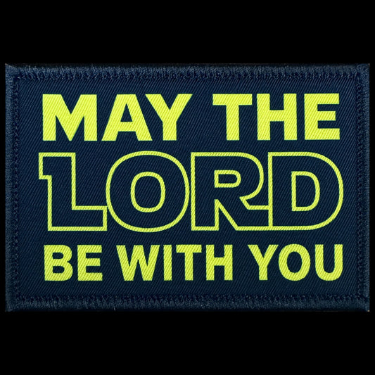 May The Lord Be With You morale patch with Yellow Star Wars styled lettering on a black background, 2x3 inch hook-and-loop fabric patch