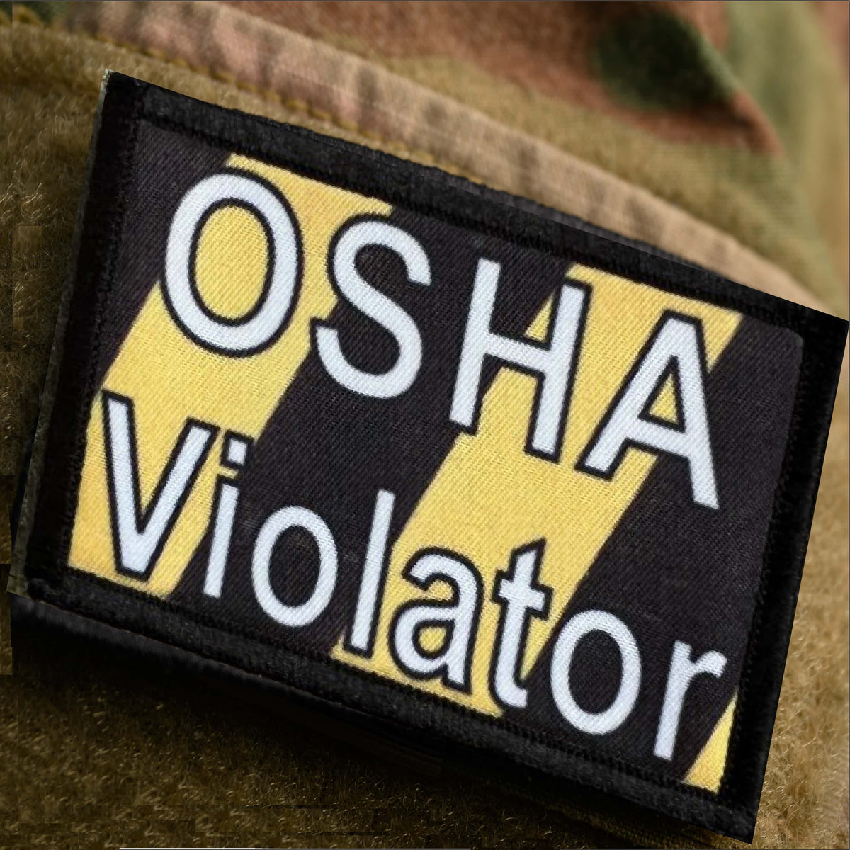 OSHA Violator Funny Morale Patch on ocp camo sleeve
