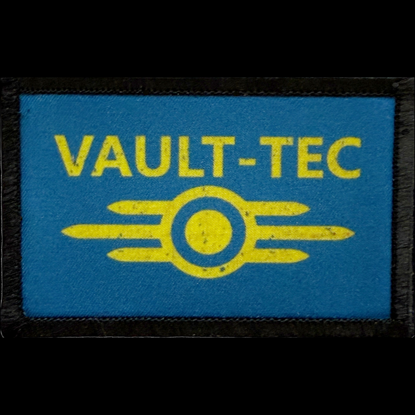 Fallout Vault-Tec logo Morale patch with blue background and yellow text and symbol