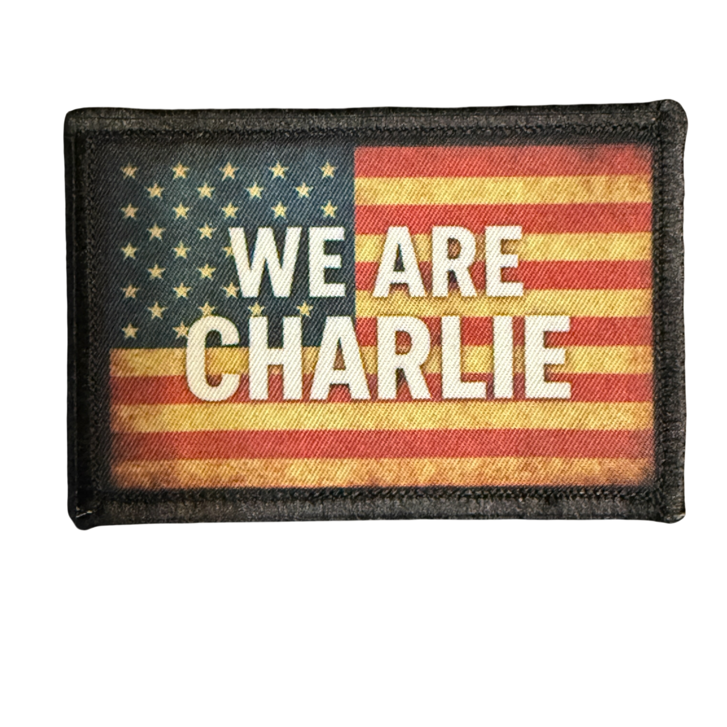 We Are Charlie Kirk Velcro Morale Patch. Subdued USA Flag charlie kirk patches 2x3 hook and loop tactical patch for backpacks, hats, Plate carriers, caps, Tactical vest and molle systems. Made in the USA