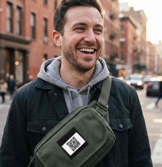 Rick Roll Qr Code Morale Patch attached to a man's tactical backpack