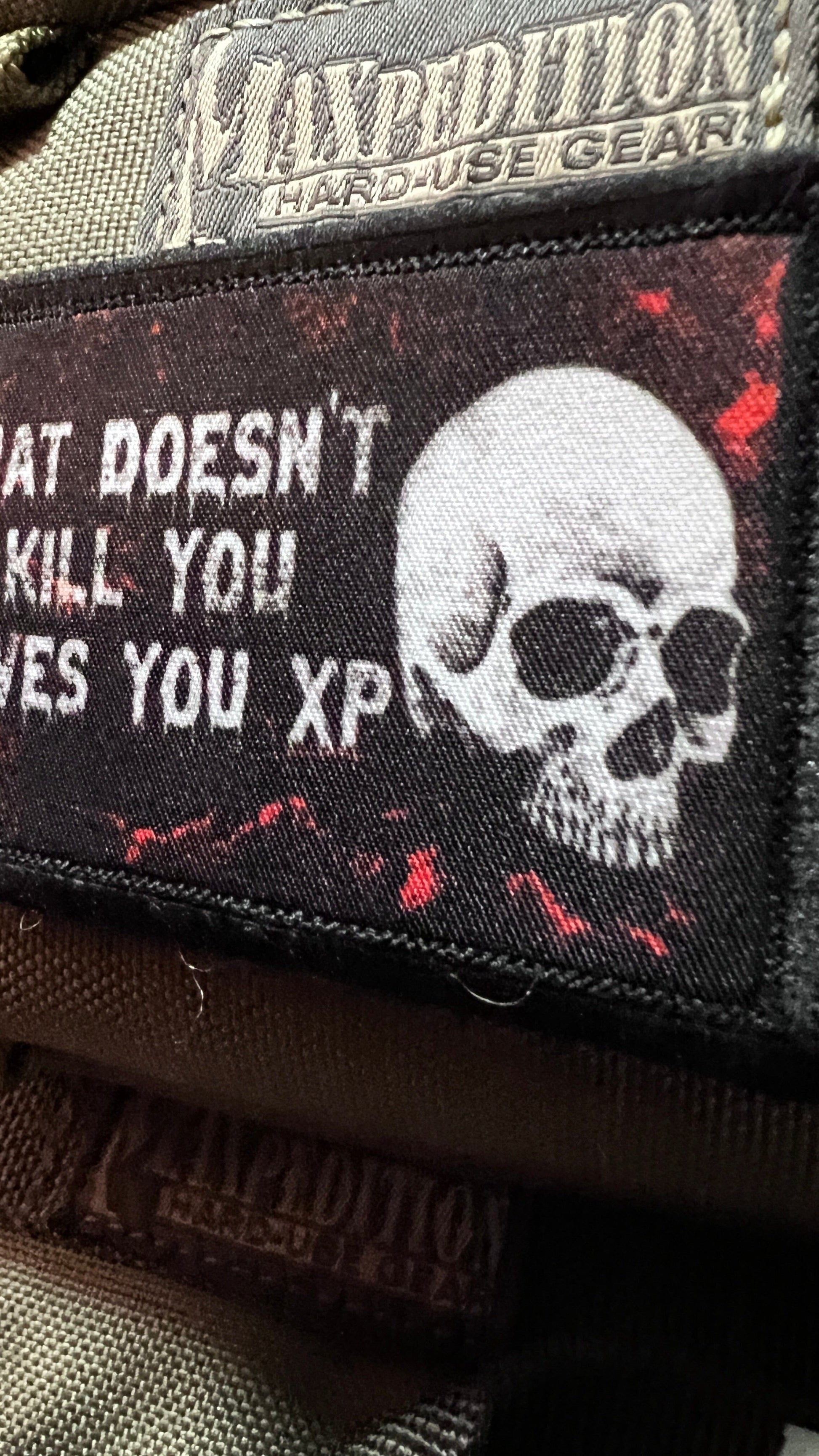 What Doesn't Kill You Gives You XP Morale Patch Morale Patches Redheaded T Shirts 